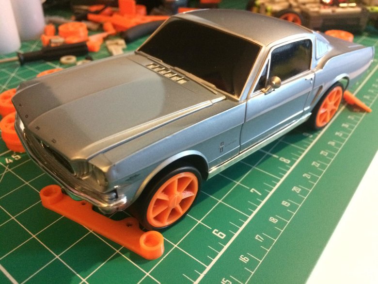 Classic Mustang on chassis with new suspension